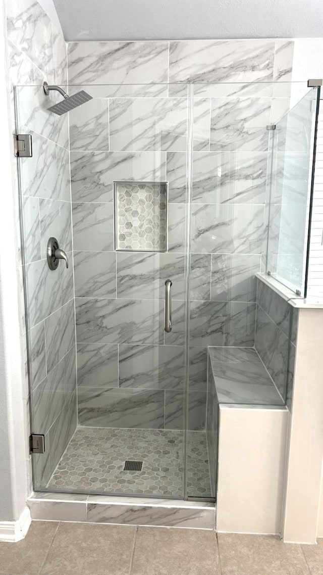 8106 Saragosa Blue Ln, Richmond, TX 77407 - full bath with a stall shower and tile patterned flooring