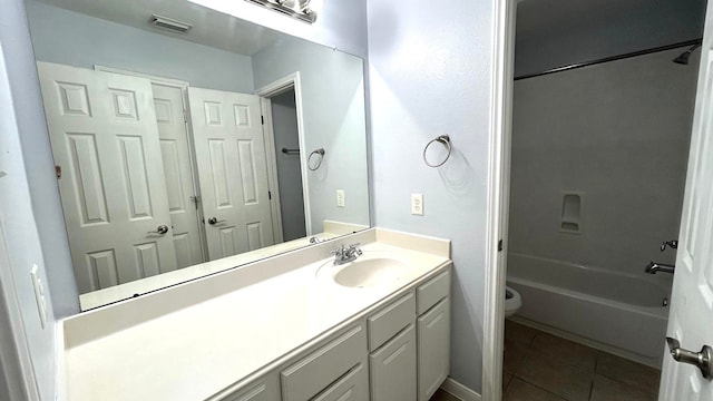 8106 Saragosa Blue Ln, Richmond, TX 77407 - bathroom with vanity, toilet, tile patterned flooring, and  shower combination