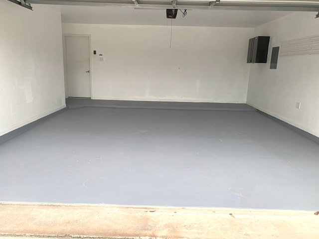 8106 Saragosa Blue Ln, Richmond, TX 77407 - garage with a garage door opener and electric panel