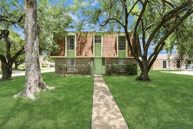 203 Kirkaldy Dr, Houston, TX 77015 - view of property with brick siding and a front yard