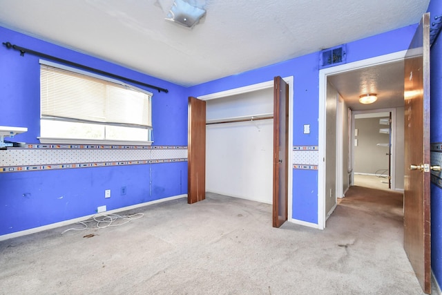 203 Kirkaldy Dr, Houston, TX 77015 - unfurnished bedroom with carpet floors, baseboards, and a closet