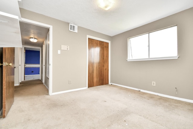 203 Kirkaldy Dr, Houston, TX 77015 - unfurnished bedroom featuring baseboards, a closet, and carpet flooring