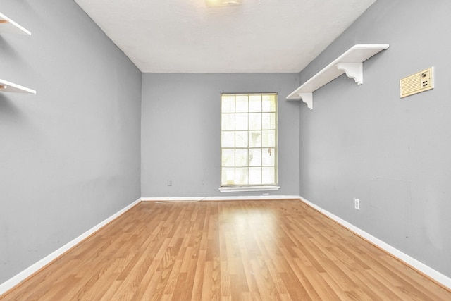 203 Kirkaldy Dr, Houston, TX 77015 - empty room with light wood-style flooring and baseboards