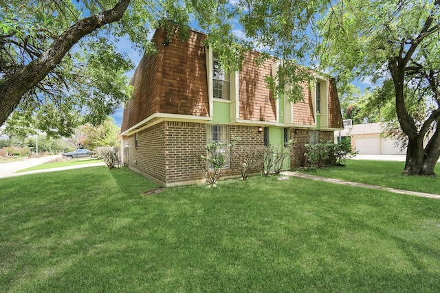 203 Kirkaldy Dr, Houston, TX 77015 - view of property exterior with mansard roof, a yard, and brick siding