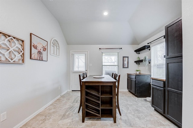 16715 Peralta Bay Cir, Crosby, TX 77532 - dining space featuring vaulted ceiling and baseboards