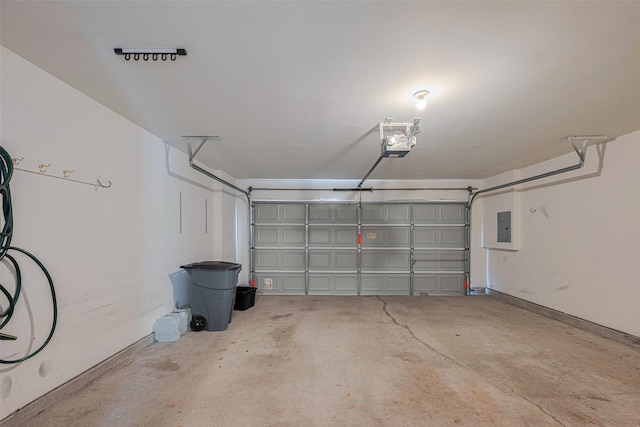 1715 Hadley St, Houston, TX 77003 - garage with electric panel and a garage door opener
