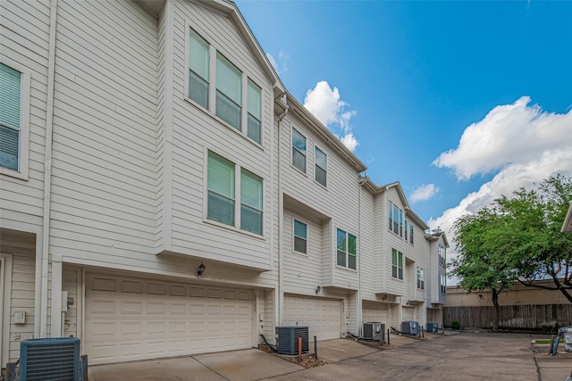 1715 Hadley St, Houston, TX 77003 - view of property featuring central AC and an attached garage