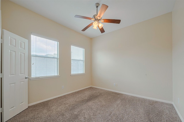 1715 Hadley St, Houston, TX 77003 - empty room featuring carpet flooring, a ceiling fan, and baseboards