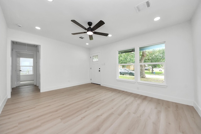11503 Duane St, Houston, TX 77047 - unfurnished room with attic access, recessed lighting, light wood-style floors, baseboards, and a ceiling fan
