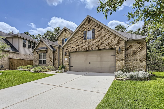 502 Pearl View Ln, Pinehurst, TX 77362 - view of front of property with brick siding, concrete driveway, and stone siding