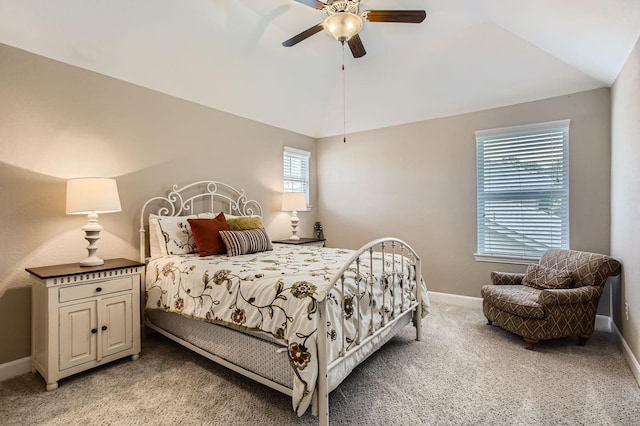 502 Pearl View Ln, Pinehurst, TX 77362 - bedroom featuring light carpet, baseboards, vaulted ceiling, and ceiling fan