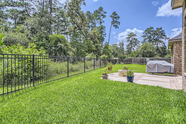 502 Pearl View Ln, Pinehurst, TX 77362 - view of yard featuring a patio