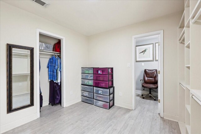 4138 Willow Bend Ln, Port Arthur, TX 77642 - walk in closet with wood finished floors