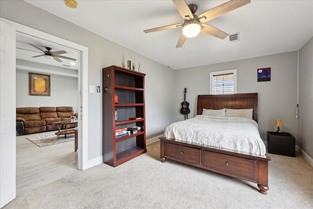 4138 Willow Bend Ln, Port Arthur, TX 77642 - bedroom with light colored carpet, baseboards, and a ceiling fan