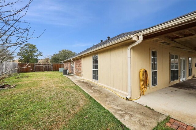 4138 Willow Bend Ln, Port Arthur, TX 77642 - view of yard featuring a patio and central AC