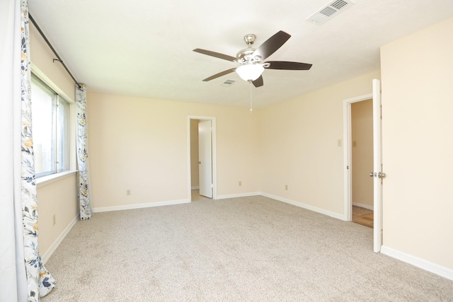 8606 Quail Vista Dr, Missouri City, TX 77489 - unfurnished bedroom featuring carpet, baseboards, and ceiling fan
