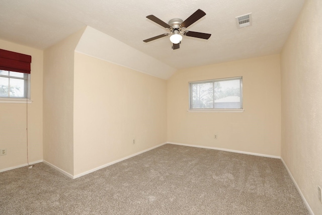 8606 Quail Vista Dr, Missouri City, TX 77489 - unfurnished room featuring carpet, healthy amount of natural light, and a ceiling fan