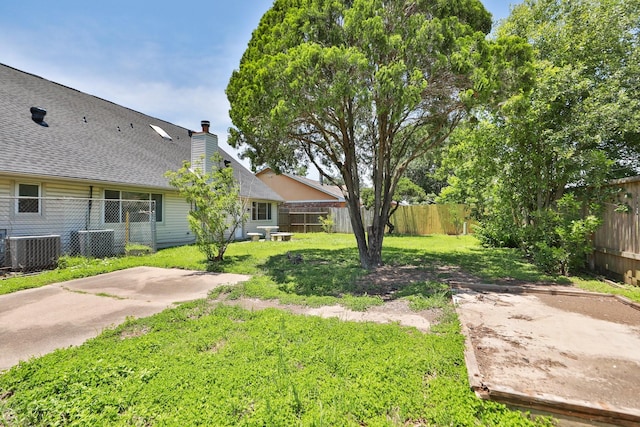 8606 Quail Vista Dr, Missouri City, TX 77489 - view of yard with central air condition unit