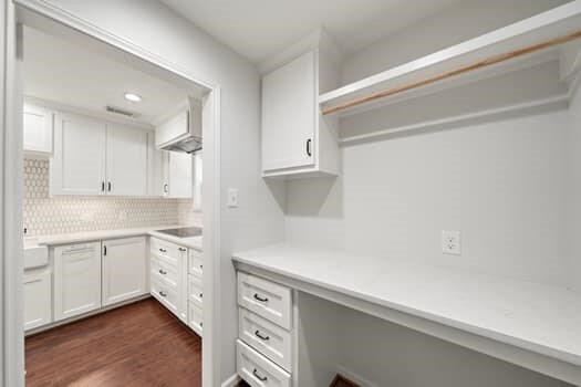 201 Vanderpool Ln Unit 118, Houston, TX 77024 - unfurnished office featuring dark wood-type flooring