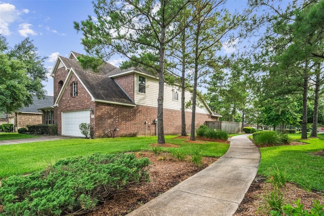 17335 Lake Clark Ln, Humble, TX 77346 - view of side of property with brick siding, asphalt driveway, a garage, and a shingled roof