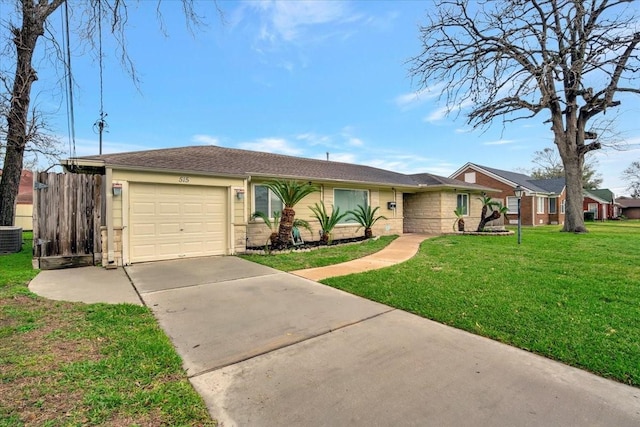 515 Canadian St, Houston, TX 77009 - ranch-style house with concrete driveway, an attached garage, and central AC unit