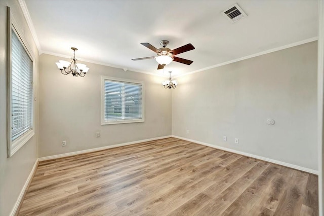 515 Canadian St, Houston, TX 77009 - empty room with a chandelier, ornamental molding, light wood finished floors, ceiling fan, and baseboards