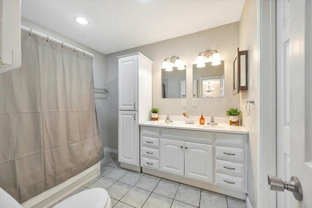 515 Canadian St, Houston, TX 77009 - full bathroom with tile patterned floors, double vanity, toilet, and curtained shower
