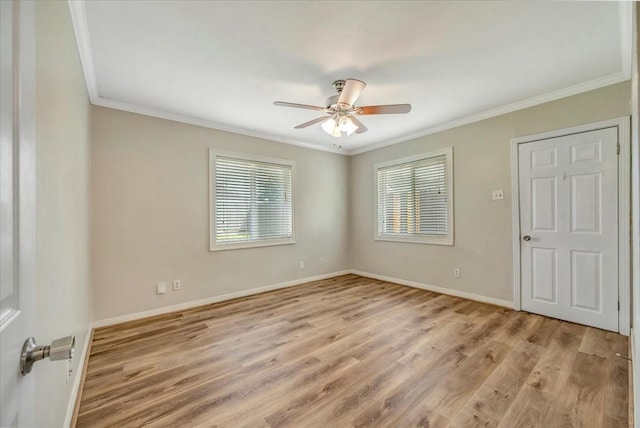 515 Canadian St, Houston, TX 77009 - spare room with crown molding, light wood-style flooring, ceiling fan, and baseboards