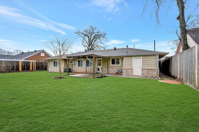 515 Canadian St, Houston, TX 77009 - back of property with stone siding and a patio area