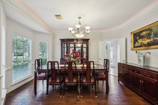 5539 Emerald Pointe Ct, Sugar Land, TX 77479 - dining room featuring a chandelier, crown molding, and dark wood-style flooring