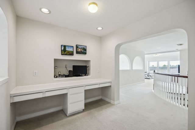 5539 Emerald Pointe Ct, Sugar Land, TX 77479 - unfurnished office featuring built in desk, light colored carpet, baseboards, recessed lighting, and ceiling fan