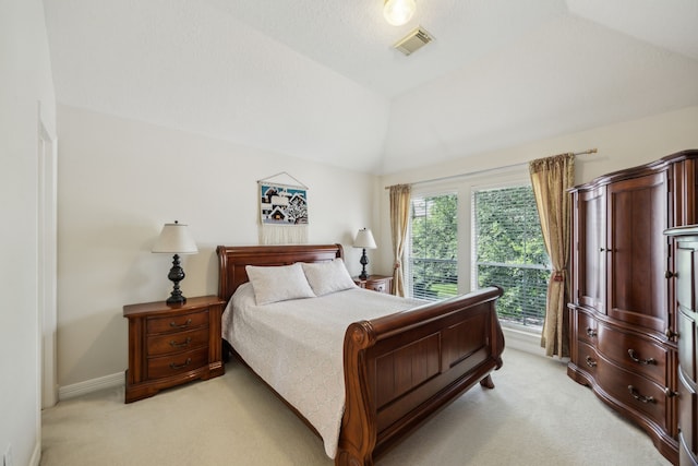 5539 Emerald Pointe Ct, Sugar Land, TX 77479 - bedroom featuring light carpet, lofted ceiling, and baseboards
