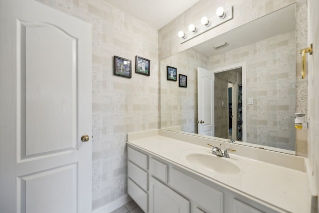 5539 Emerald Pointe Ct, Sugar Land, TX 77479 - bathroom with vanity and tile patterned flooring