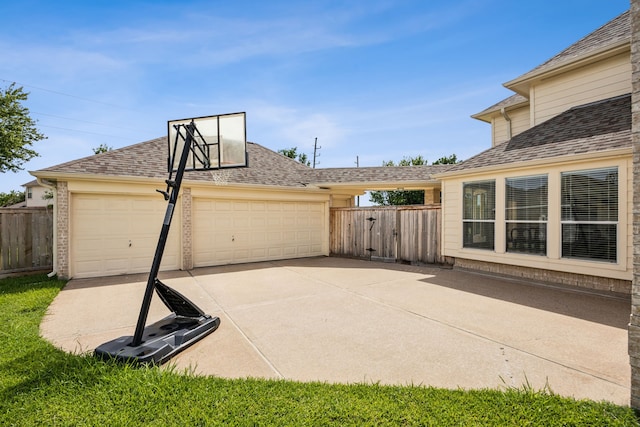 5539 Emerald Pointe Ct, Sugar Land, TX 77479 - view of patio / terrace with a garage