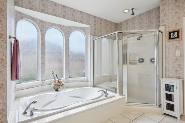 5539 Emerald Pointe Ct, Sugar Land, TX 77479 - bathroom featuring wallpapered walls, healthy amount of natural light, a stall shower, a whirlpool tub, and tile patterned floors