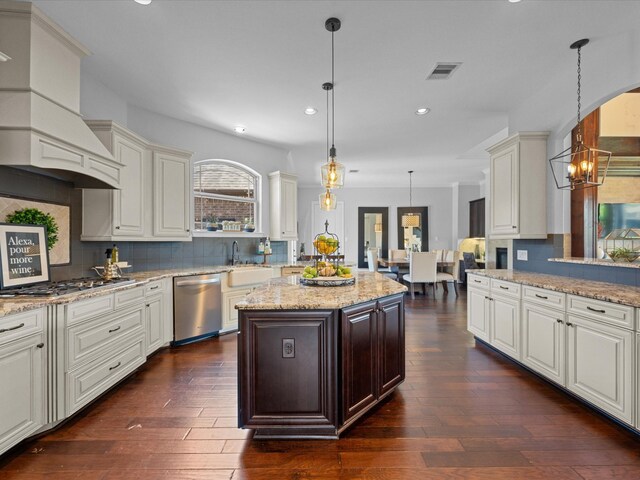 17611 Bear River Ln, Humble, TX 77346 - kitchen with appliances with stainless steel finishes, a sink, recessed lighting, a chandelier, and backsplash