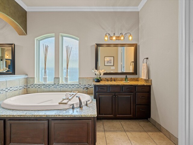 17611 Bear River Ln, Humble, TX 77346 - full bathroom with vanity, a garden tub, tile patterned floors, and crown molding