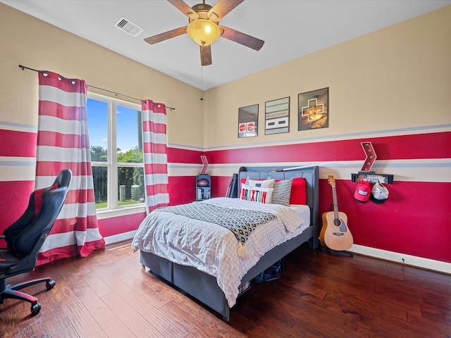 17611 Bear River Ln, Humble, TX 77346 - bedroom with wood finished floors, baseboards, ceiling fan, and an office area