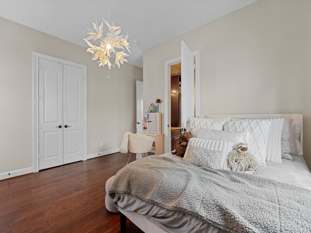 17611 Bear River Ln, Humble, TX 77346 - bedroom featuring wood finished floors, baseboards, and a closet