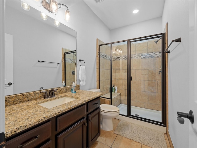 17611 Bear River Ln, Humble, TX 77346 - bathroom with toilet, vanity, a stall shower, and tile patterned floors
