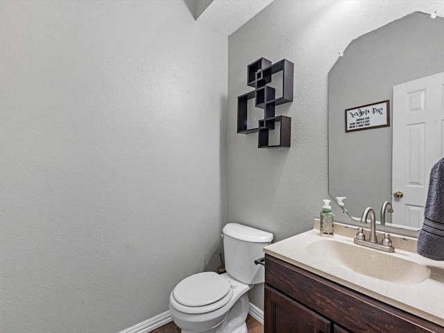 3106 Lake Breeze Ln, Crosby, TX 77532 - half bathroom featuring toilet, vanity, and baseboards