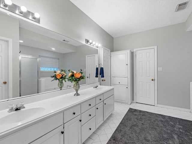 3106 Lake Breeze Ln, Crosby, TX 77532 - bathroom featuring double vanity and a shower stall