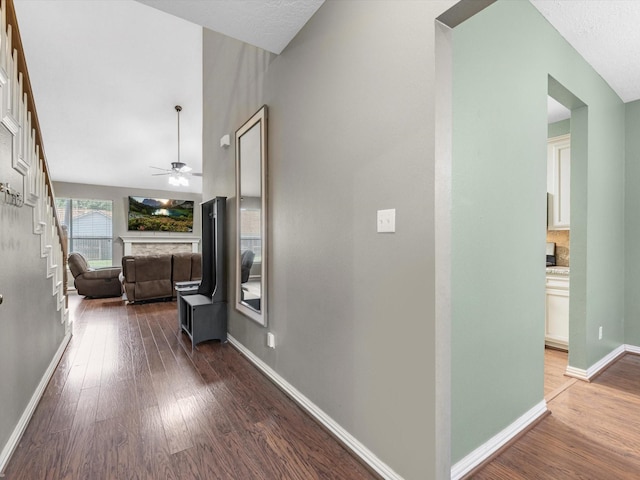 3106 Lake Breeze Ln, Crosby, TX 77532 - corridor featuring dark wood finished floors and baseboards