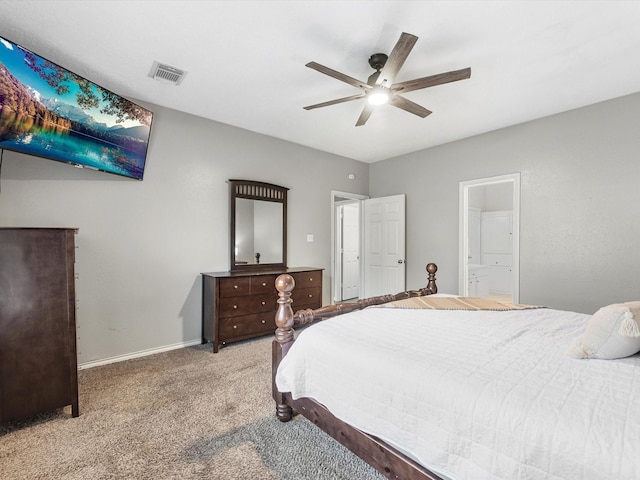 3106 Lake Breeze Ln, Crosby, TX 77532 - bedroom featuring carpet, baseboards, ceiling fan, and connected bathroom