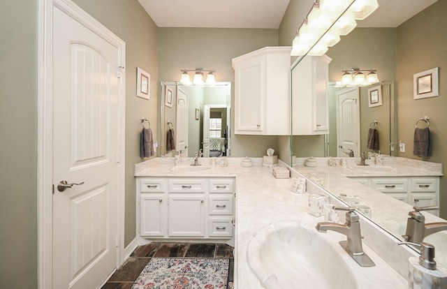 23442 Hillcrest Dr, Hockley, TX 77447 - ensuite bathroom featuring double vanity and wood finished floors