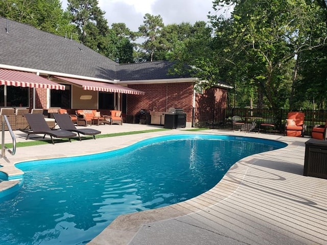 23442 Hillcrest Dr, Hockley, TX 77447 - view of swimming pool with a patio area