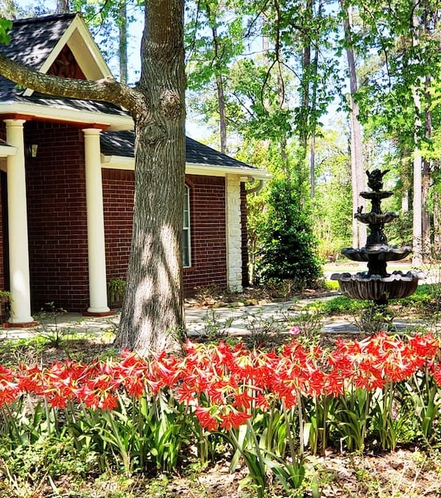 23442 Hillcrest Dr, Hockley, TX 77447 - view of property exterior with brick siding and a shingled roof