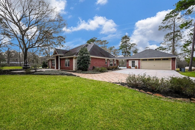 23442 Hillcrest Dr, Hockley, TX 77447 - view of front of house with driveway, brick siding, a front lawn, and a garage