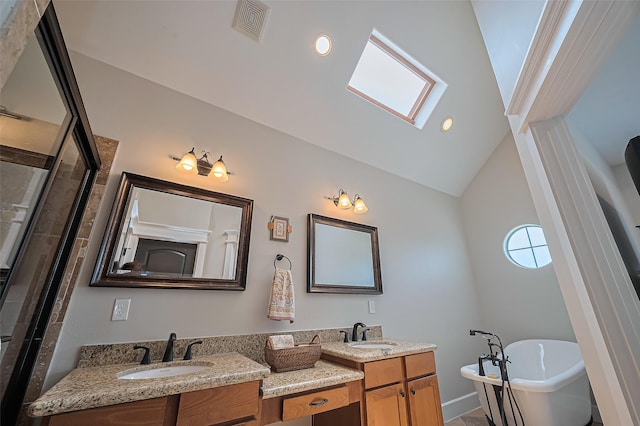 804 Enid St Unit A, Houston, TX 77009 - bathroom with a soaking tub, double vanity, a skylight, tiled shower, and lofted ceiling