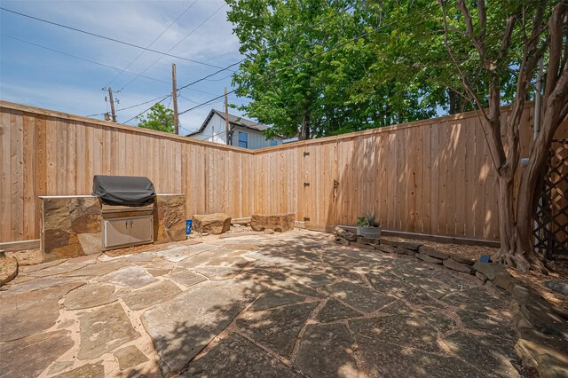804 Enid St Unit A, Houston, TX 77009 - fenced backyard with a patio area